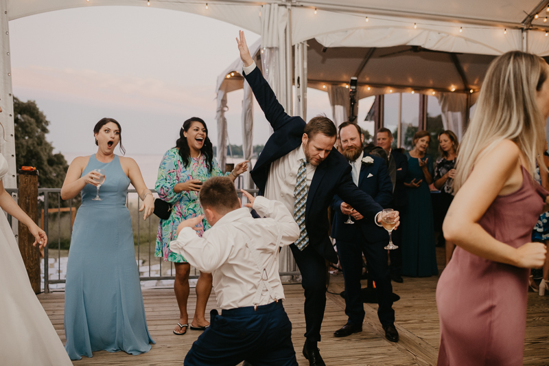 An exciting evening wedding reception by DJ Premonition from Mixing Maryland at the Chesapeake Bay Foundation in Annapolis Maryland by Britney Clause Photography