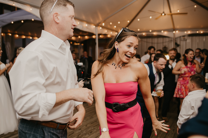 An exciting evening wedding reception by DJ Premonition from Mixing Maryland at the Chesapeake Bay Foundation in Annapolis Maryland by Britney Clause Photography