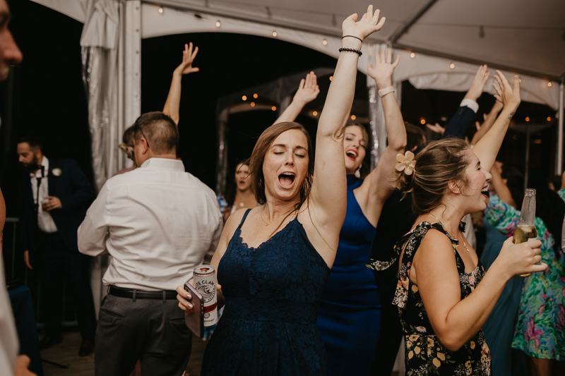 An exciting evening wedding reception by DJ Premonition from Mixing Maryland at the Chesapeake Bay Foundation in Annapolis Maryland by Britney Clause Photography