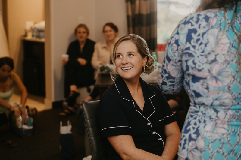 A bride getting ready for her wedding at Celebrations at the Bay in Pasadena, Maryland by Britney Clause Photography