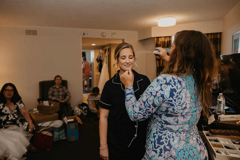 A bride getting ready for her wedding at Celebrations at the Bay in Pasadena, Maryland by Britney Clause Photography