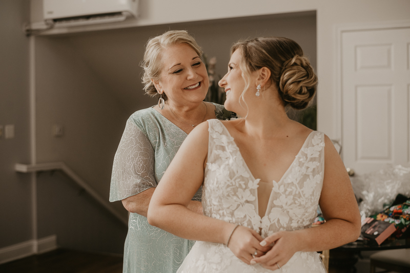 A bride getting ready for her wedding at Celebrations at the Bay in Pasadena, Maryland by Britney Clause Photography