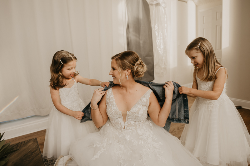 A bride getting ready for her wedding at Celebrations at the Bay in Pasadena, Maryland by Britney Clause Photography