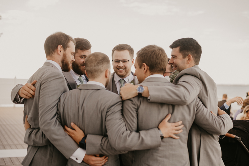 A groom getting ready for his wedding at Celebrations at the Bay in Pasadena, Maryland by Britney Clause Photography