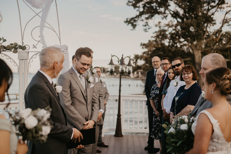 Amazing waterfront wedding ceremony at Celebrations at the Bay in Pasadena, Maryland by Britney Clause Photography