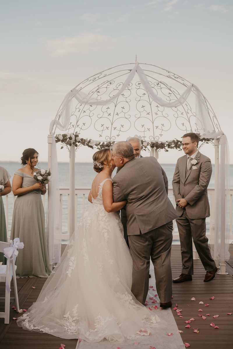 Amazing waterfront wedding ceremony at Celebrations at the Bay in Pasadena, Maryland by Britney Clause Photography