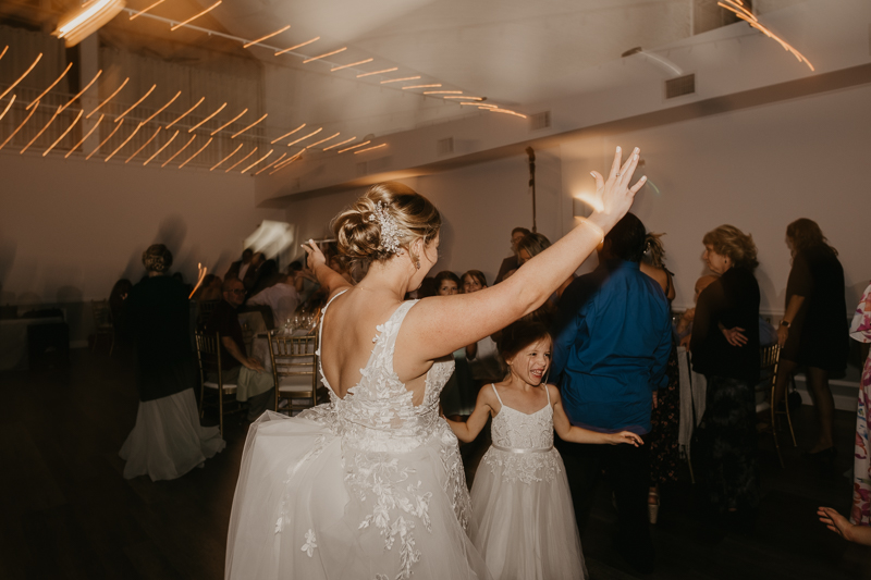 A fun evening wedding reception at Celebrations at the Bay in Pasadena, Maryland by Britney Clause Photography