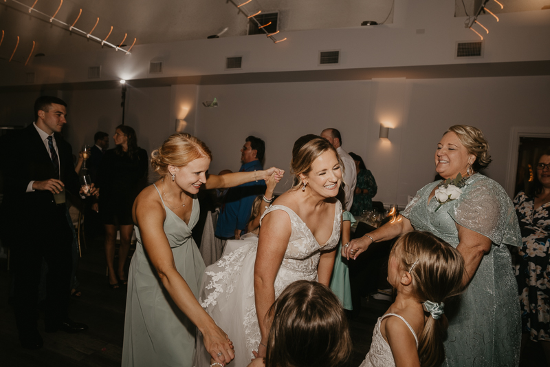 A fun evening wedding reception at Celebrations at the Bay in Pasadena, Maryland by Britney Clause Photography