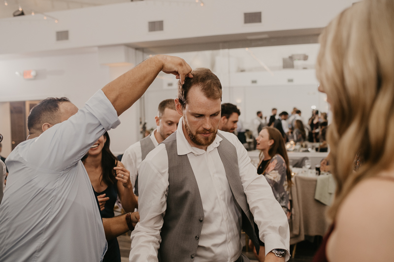 A fun evening wedding reception at Celebrations at the Bay in Pasadena, Maryland by Britney Clause Photography