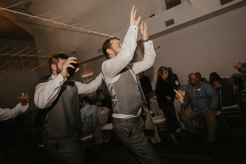 A fun evening wedding reception at Celebrations at the Bay in Pasadena, Maryland by Britney Clause Photography