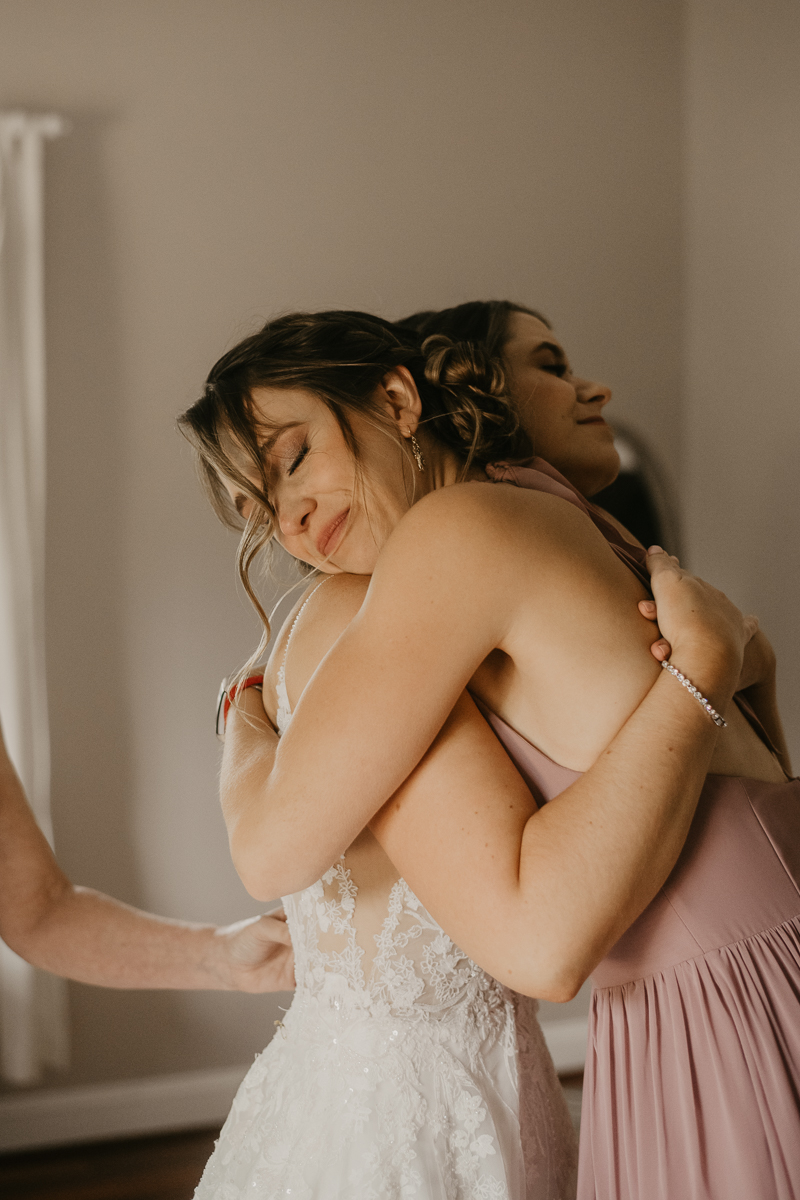 A bride getting ready at Rose Hill Manor in Leesburg, Virginia by Britney Clause Photography