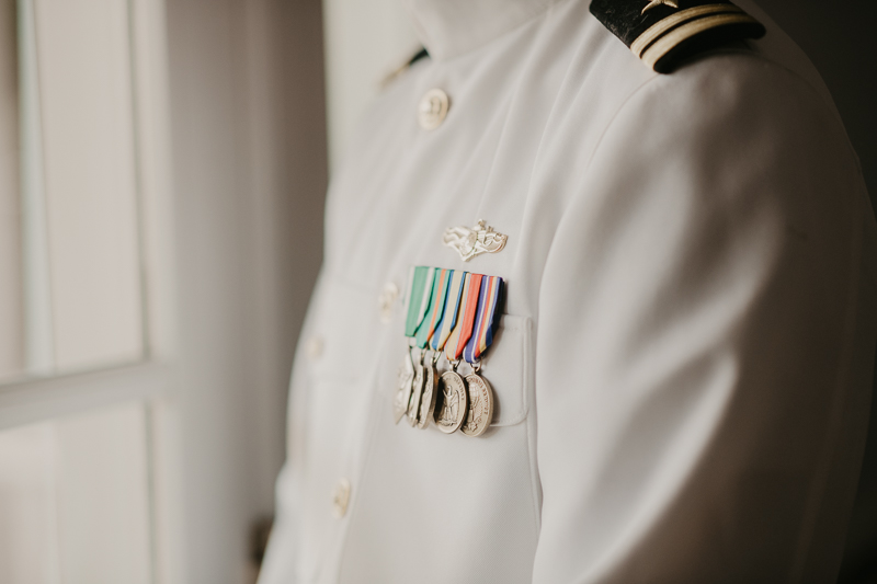 A groom getting ready at Rose Hill Manor in Leesburg, Virginia by Britney Clause Photography