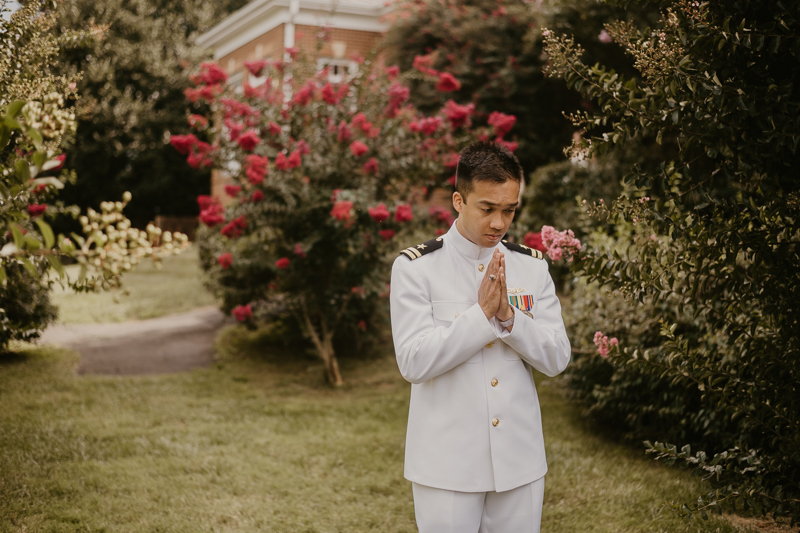 A beautiful first look between a bride and groom at Rose Hill Manor in Leesburg, Virginia by Britney Clause Photography