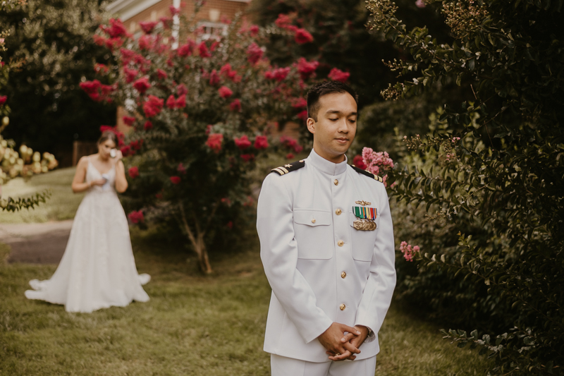 A beautiful first look between a bride and groom at Rose Hill Manor in Leesburg, Virginia by Britney Clause Photography