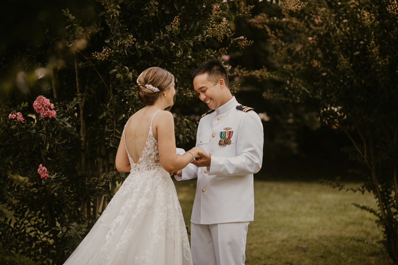 A beautiful first look between a bride and groom at Rose Hill Manor in Leesburg, Virginia by Britney Clause Photography