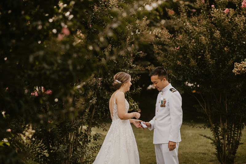 A beautiful first look between a bride and groom at Rose Hill Manor in Leesburg, Virginia by Britney Clause Photography