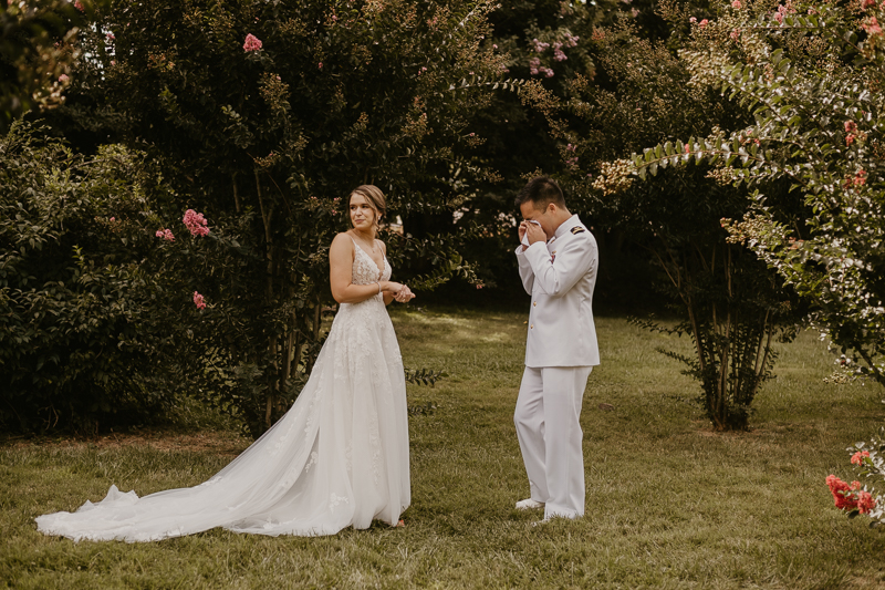 A beautiful first look between a bride and groom at Rose Hill Manor in Leesburg, Virginia by Britney Clause Photography