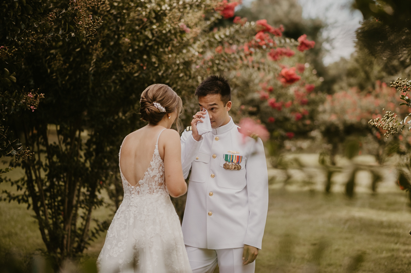 A beautiful first look between a bride and groom at Rose Hill Manor in Leesburg, Virginia by Britney Clause Photography