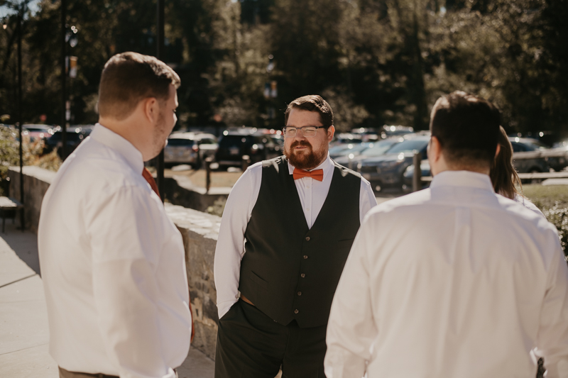 A groom getting ready at Main Street Ballroom in Ellicott City, Maryland by Britney Clause Photography