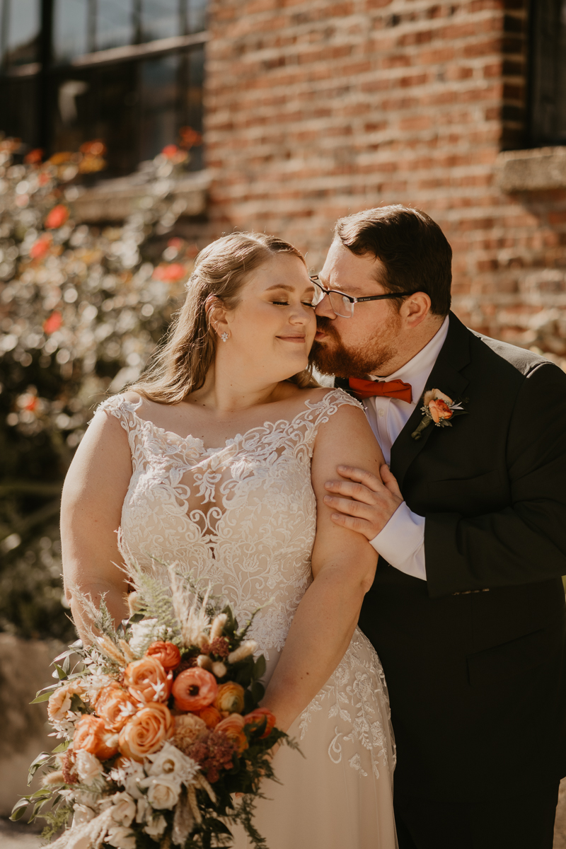 Beautiful bride and groom portraits at Main Street Ballroom in Ellicott City, Maryland by Britney Clause Photography