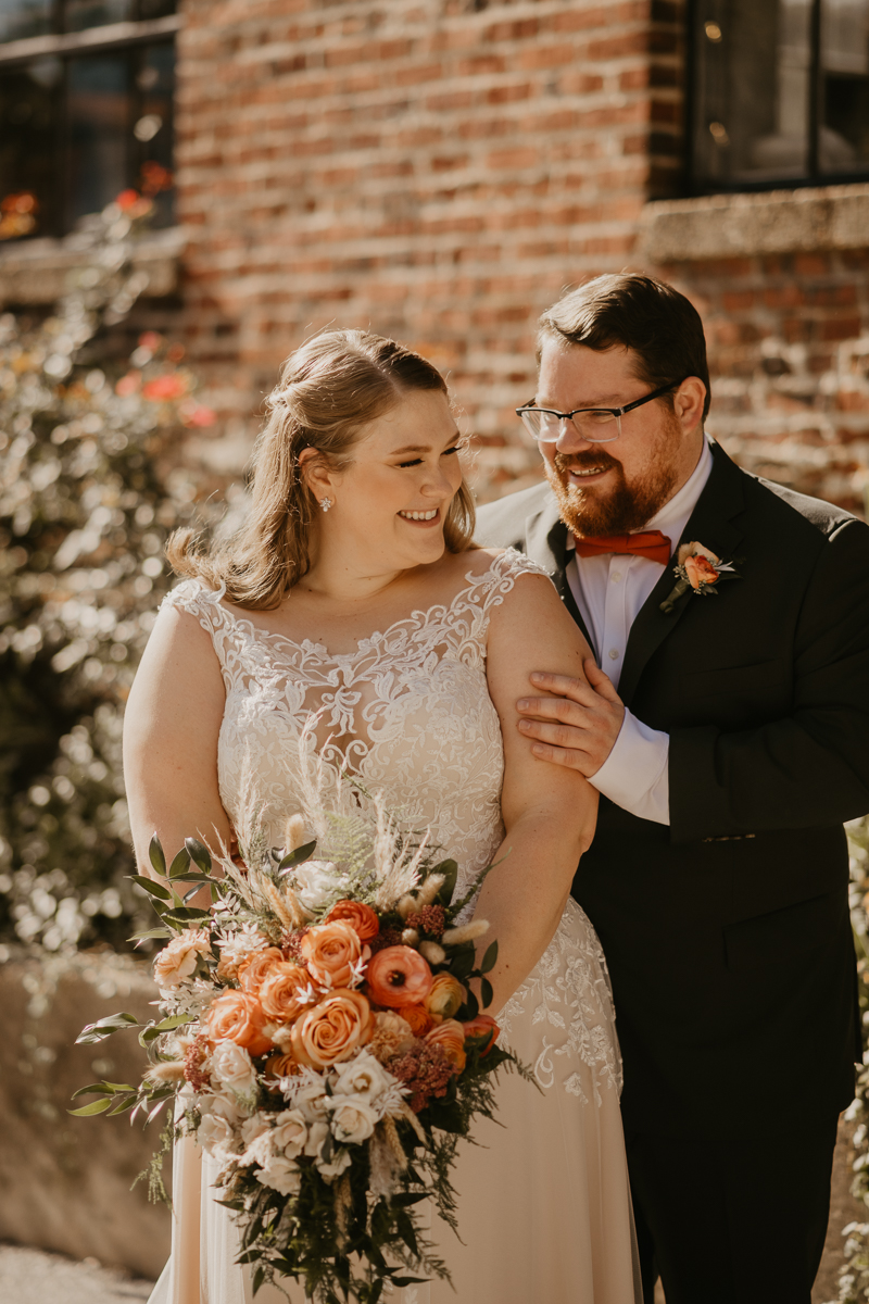 Beautiful bride and groom portraits at Main Street Ballroom in Ellicott City, Maryland by Britney Clause Photography