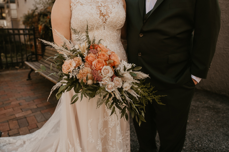 Gorgeous bridal bouquet by Blossom and Basket Boutique at Main Street Ballroom in Ellicott City, Maryland by Britney Clause Photography