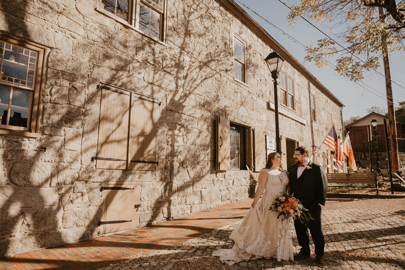 Beautiful bride and groom portraits at Main Street Ballroom in Ellicott City, Maryland by Britney Clause Photography