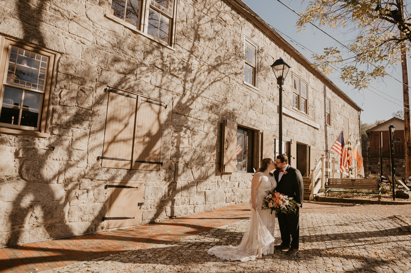 Beautiful bride and groom portraits at Main Street Ballroom in Ellicott City, Maryland by Britney Clause Photography