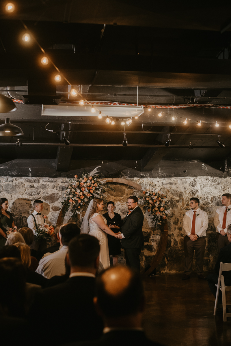 Amazing industrial wedding ceremony at Main Street Ballroom in Ellicott City, Maryland by Britney Clause Photography