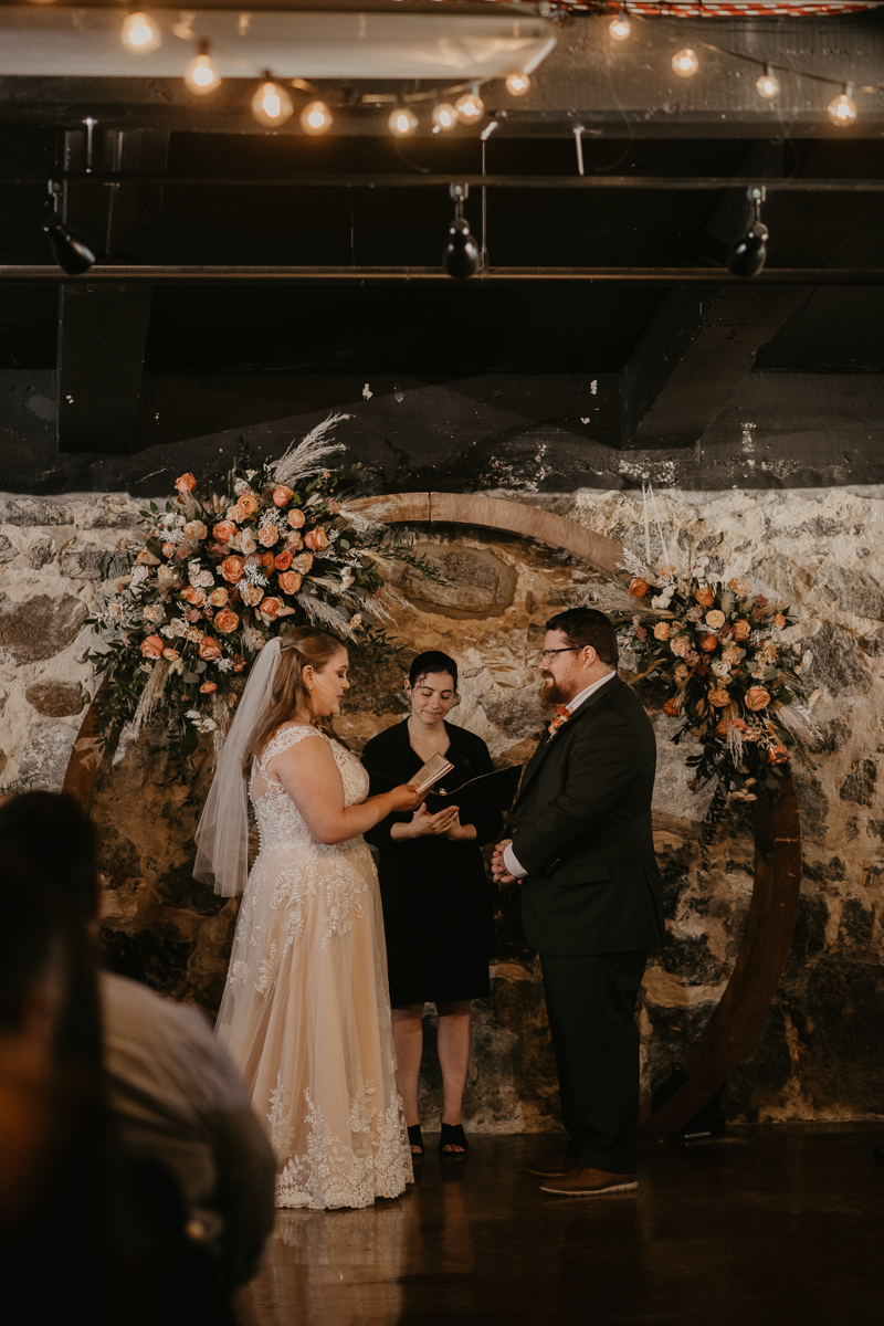 Amazing industrial wedding ceremony at Main Street Ballroom in Ellicott City, Maryland by Britney Clause Photography