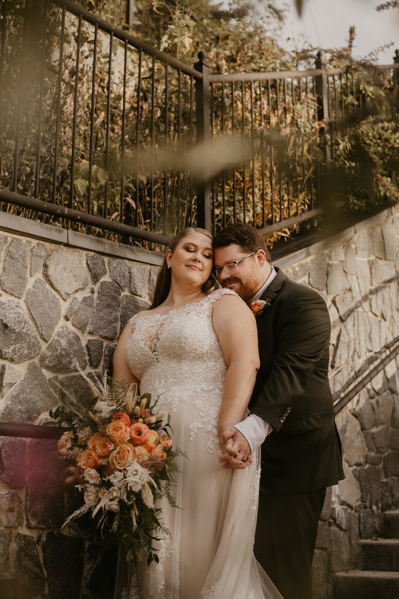 Stunning bride and groom wedding portraits at Main Street Ballroom in Ellicott City, Maryland by Britney Clause Photography