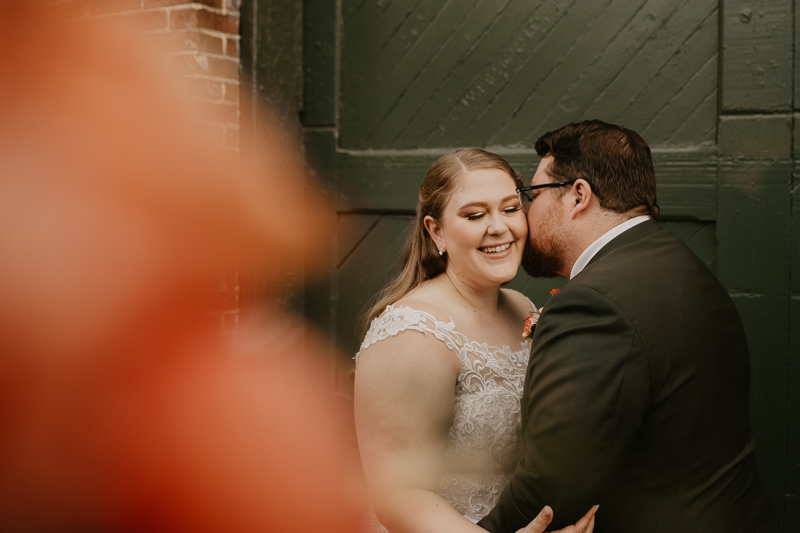 Stunning bride and groom wedding portraits at Main Street Ballroom in Ellicott City, Maryland by Britney Clause Photography