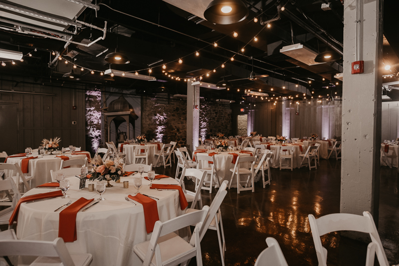 Gorgeous industrial wedding reception decor at Main Street Ballroom in Ellicott City, Maryland by Britney Clause Photography