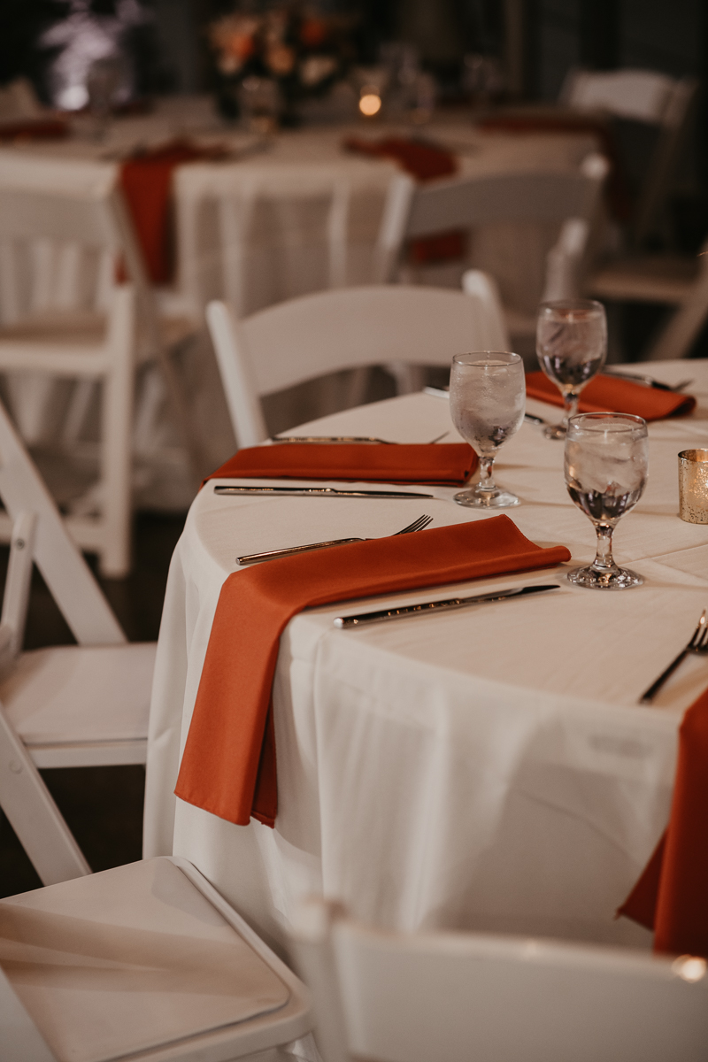 Gorgeous industrial wedding reception decor at Main Street Ballroom in Ellicott City, Maryland by Britney Clause Photography