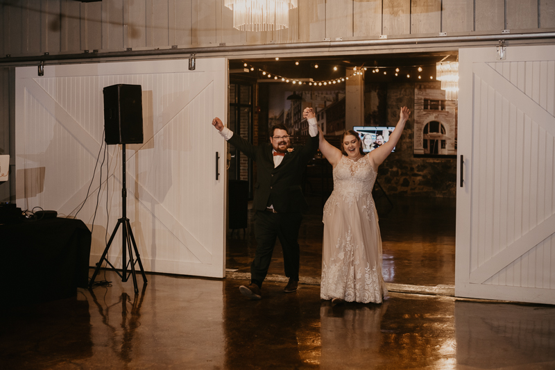 A stunning industrial wedding reception at Main Street Ballroom in Ellicott City, Maryland by Britney Clause Photography