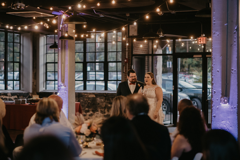 A stunning industrial wedding reception at Main Street Ballroom in Ellicott City, Maryland by Britney Clause Photography