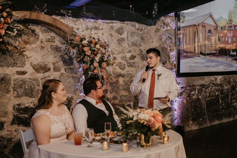 A stunning industrial wedding reception at Main Street Ballroom in Ellicott City, Maryland by Britney Clause Photography