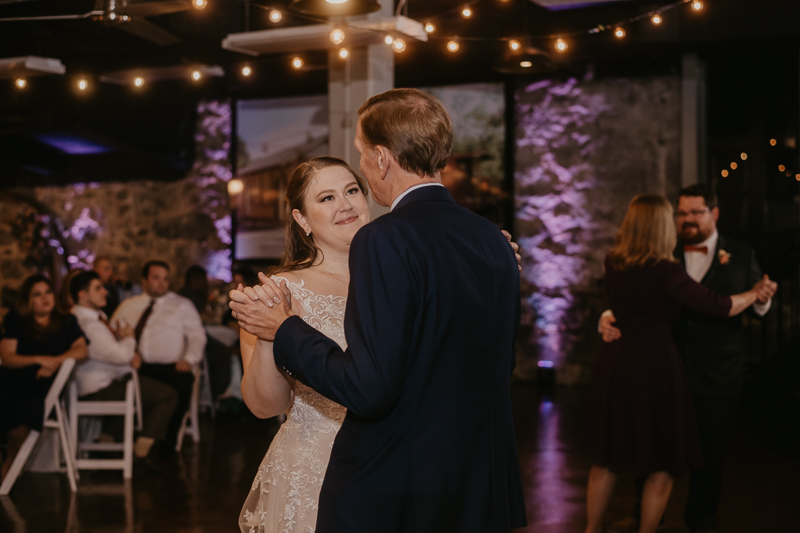 A stunning industrial wedding reception at Main Street Ballroom in Ellicott City, Maryland by Britney Clause Photography