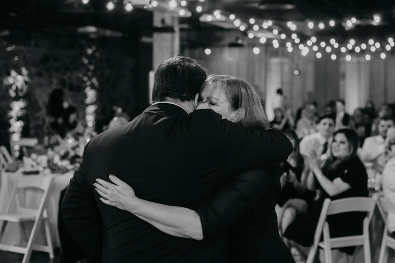 A stunning industrial wedding reception at Main Street Ballroom in Ellicott City, Maryland by Britney Clause Photography