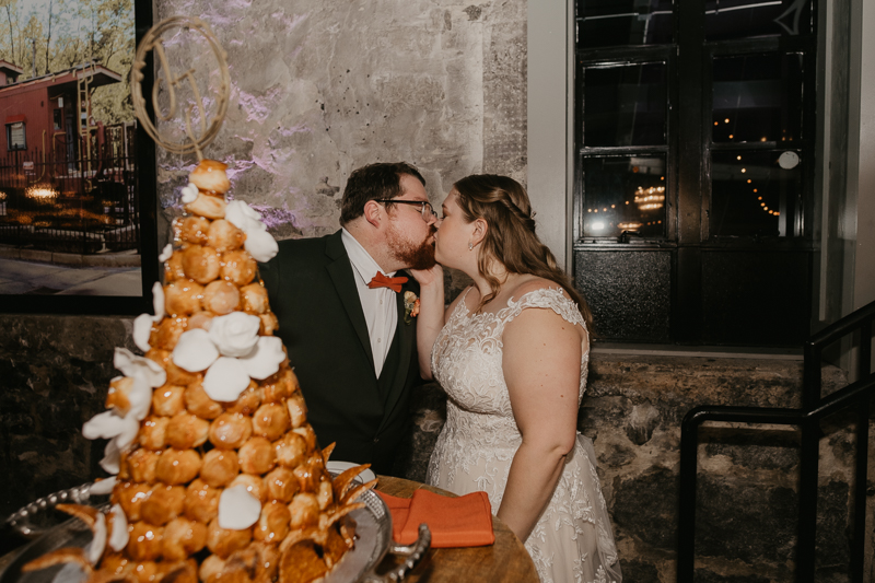 A stunning industrial wedding reception at Main Street Ballroom in Ellicott City, Maryland by Britney Clause Photography