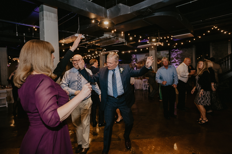 An exciting evening wedding reception by DJ Black Wizard at Main Street Ballroom in Ellicott City, Maryland by Britney Clause Photography