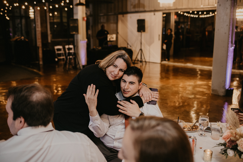 An exciting evening wedding reception by DJ Black Wizard at Main Street Ballroom in Ellicott City, Maryland by Britney Clause Photography