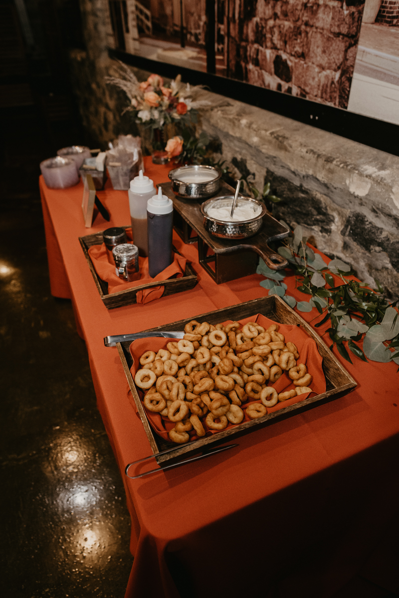 A fun donut bar by Zeffert and Gold Catering at Main Street Ballroom in Ellicott City, Maryland by Britney Clause Photography