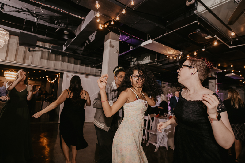 An exciting evening wedding reception by DJ Black Wizard at Main Street Ballroom in Ellicott City, Maryland by Britney Clause Photography