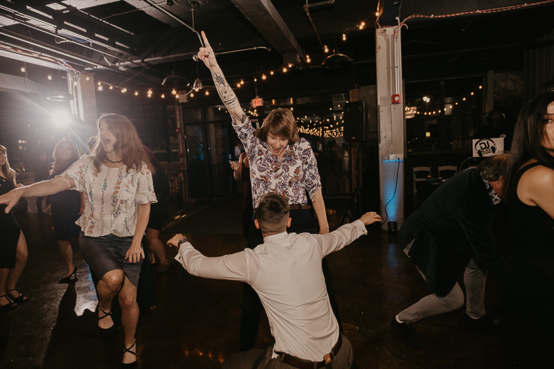 An exciting evening wedding reception by DJ Black Wizard at Main Street Ballroom in Ellicott City, Maryland by Britney Clause Photography