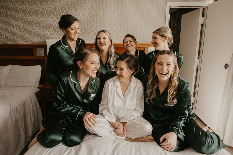 A bride getting ready at the Double Tree Hilton Hotel Baltimore for a Mt. Washington Mill Dye House in Baltimore, Maryland by Britney Clause Photography