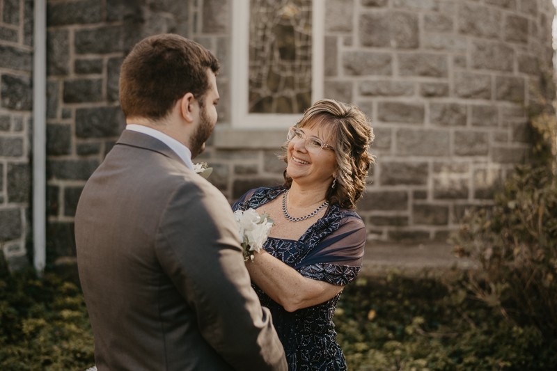 A groom getting ready at the Double Tree Hilton Hotel Baltimore for a Mt. Washington Mill Dye House in Baltimore, Maryland by Britney Clause Photography