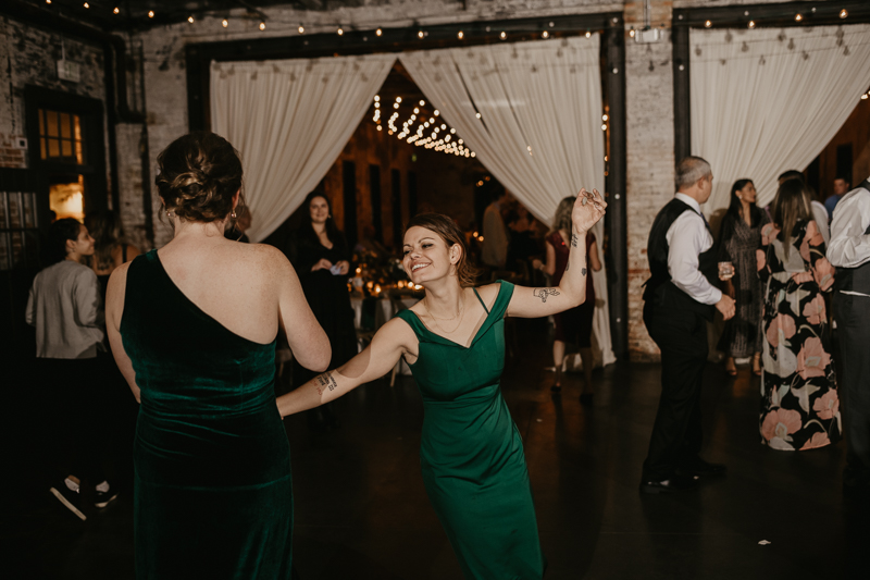 An evening wedding reception at the Mt. Washington Mill Dye House in Baltimore, Maryland by Britney Clause Photography