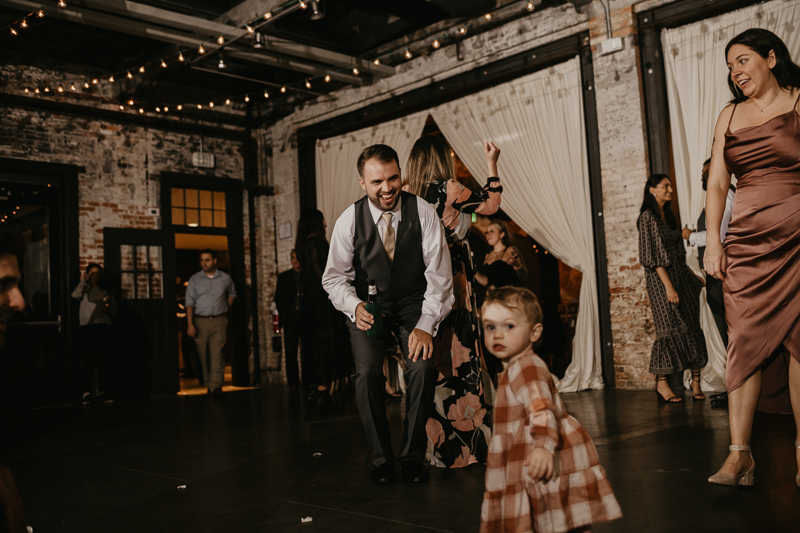 An evening wedding reception at the Mt. Washington Mill Dye House in Baltimore, Maryland by Britney Clause Photography