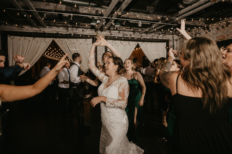 An evening wedding reception at the Mt. Washington Mill Dye House in Baltimore, Maryland by Britney Clause Photography